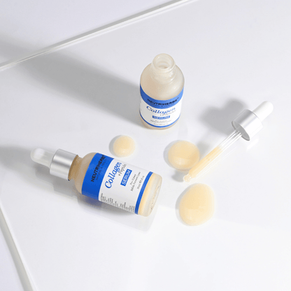 Neutriherbs Collagen + Peptides Serum 30 ml z odprto stekleničko, pipeto in teksturo seruma. Bližnji posnetek prikazuje svilnato gladko konsistenco in praktičen aplikator s pipeto za natančno odmerjanje.